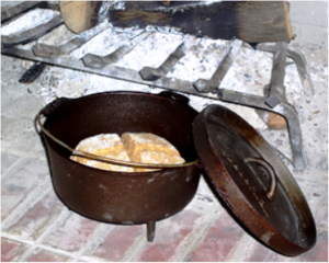 Soda bread cooking in a heavy pot on the fire, from http://kitchenproject.com/history/IrishSodaBreads/